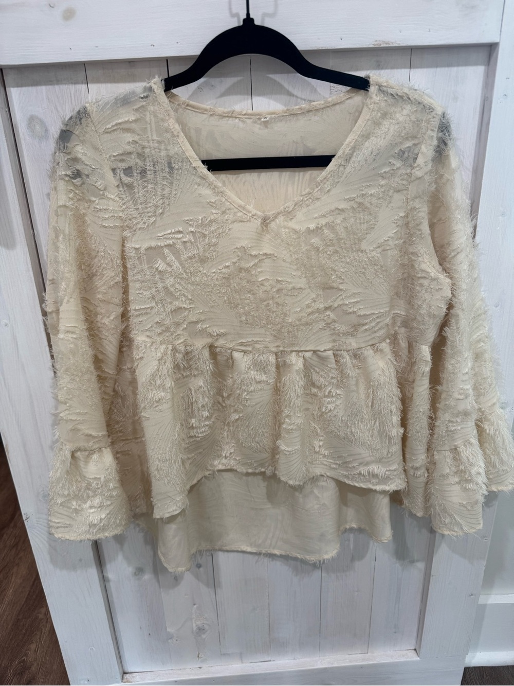 Women's Cream Textured V-Neck Peplum Top
